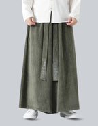 Clotechnow Harajuku volume hakama pants in green corduroy with wide-leg silhouette and embroidered front detail