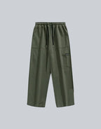 Clotechnow green wide-leg hakama pants with an elastic waistband, drawstring, and side pocket detail.