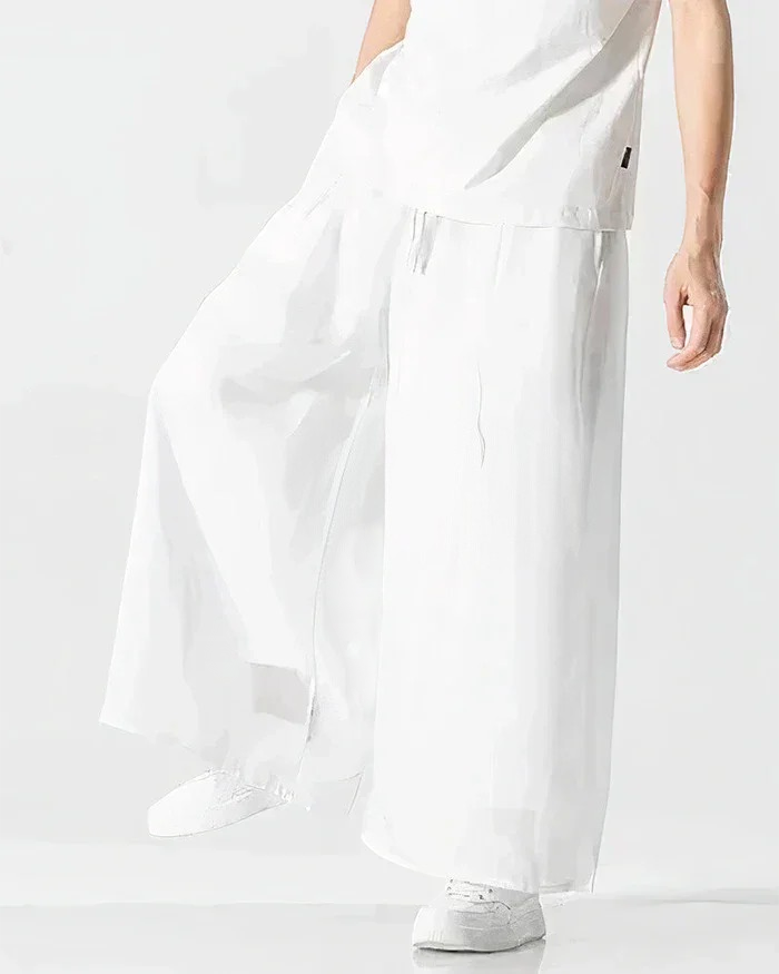Clotechnow Ivory Flow Hakama Pants in white with a wide-leg draped silhouette and a lightweight fabric finish.