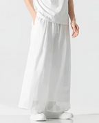 Clotechnow ivory flow hakama pants with a wide-leg draped silhouette and drawstring waist in a modern streetwear style