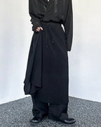 Clotechnow Kuro Frame black hakama pants with a wide-leg draped silhouette and drawstring waist in a streetwear style.