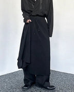 Clotechnow Kuro Frame black wide-leg hakama pants with draped fabric and drawstring waist in a streetwear style