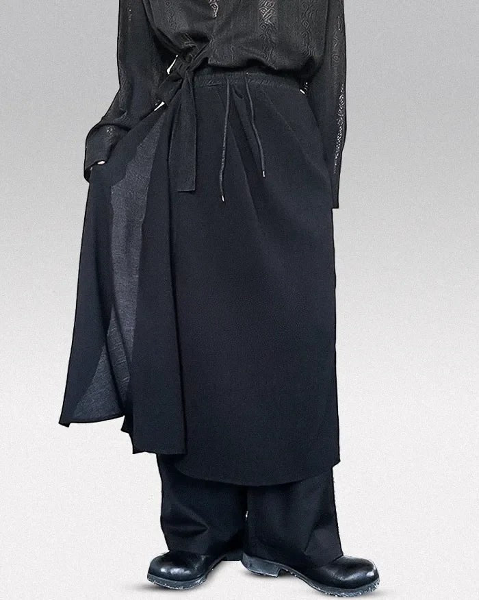Clotechnow Kuro Frame Hakama pants in black featuring a wide-leg draped silhouette with a tie-waist detail.