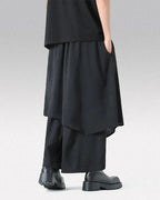 Clotechnow Monochrome Divide black hakama pants with a wide-leg draped silhouette and layered design