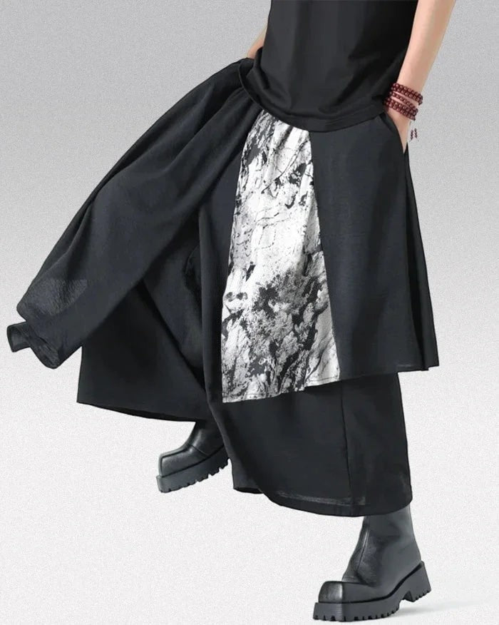 Clotechnow Monochrome Divide Hakama Pants in black with a white abstract print panel and wide-leg draped silhouette.