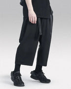 Clotechnow Ninja Motion Hakama pants in black with a wide-leg silhouette and integrated belt for a techwear look.