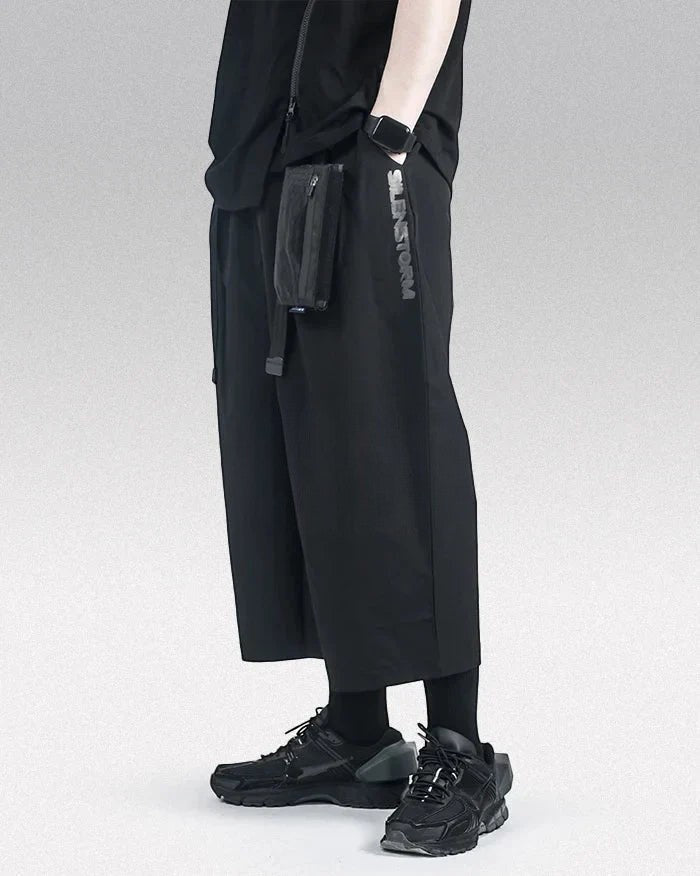 Clotechnow Ninja Motion Hakama pants in black with a wide-leg silhouette, side pocket, and techwear aesthetic.