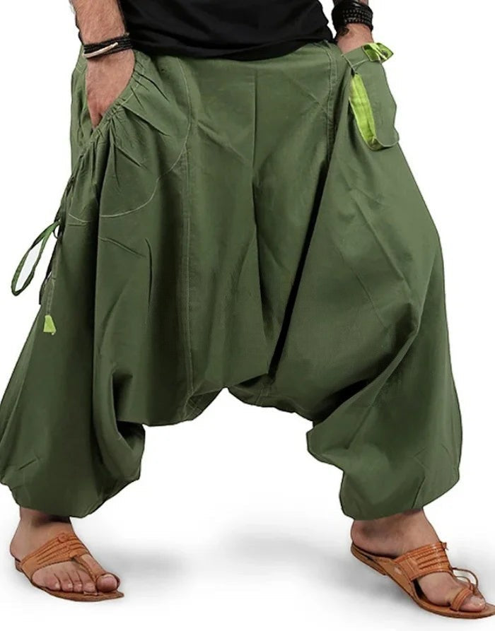 Clotechnow Forest Tone wide-leg hakama pants in olive green with draped silhouette and side pocket details.