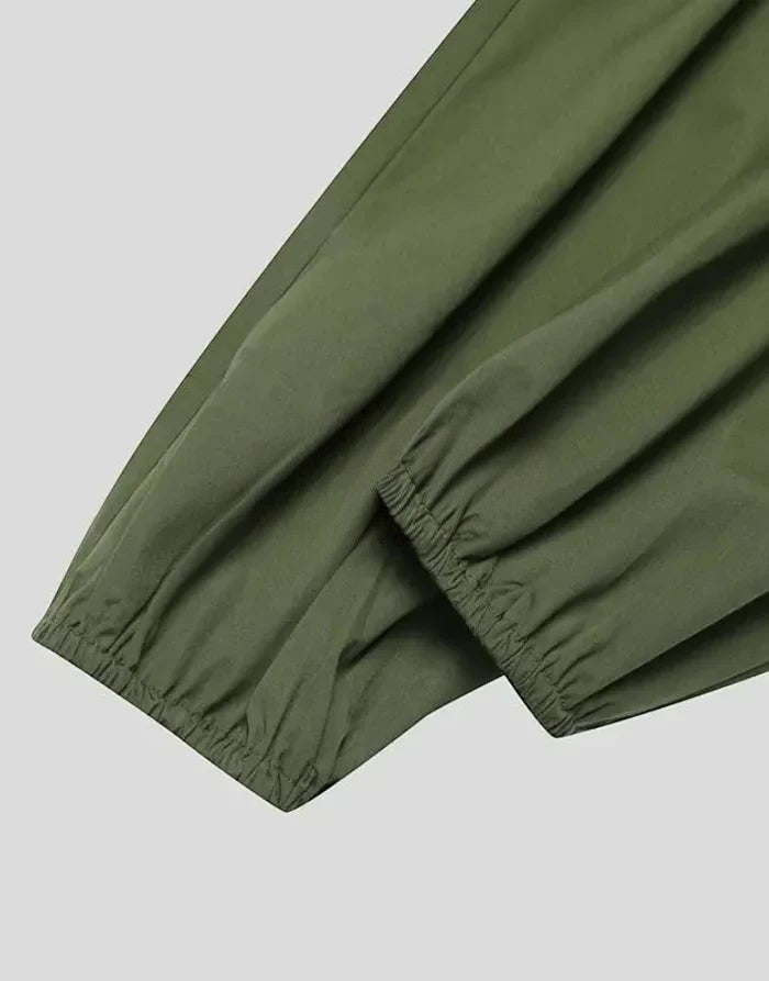 Clotechnow Forest Tone Hakama pants featuring a wide-leg silhouette and elasticated cuffs in a deep olive green fabric.