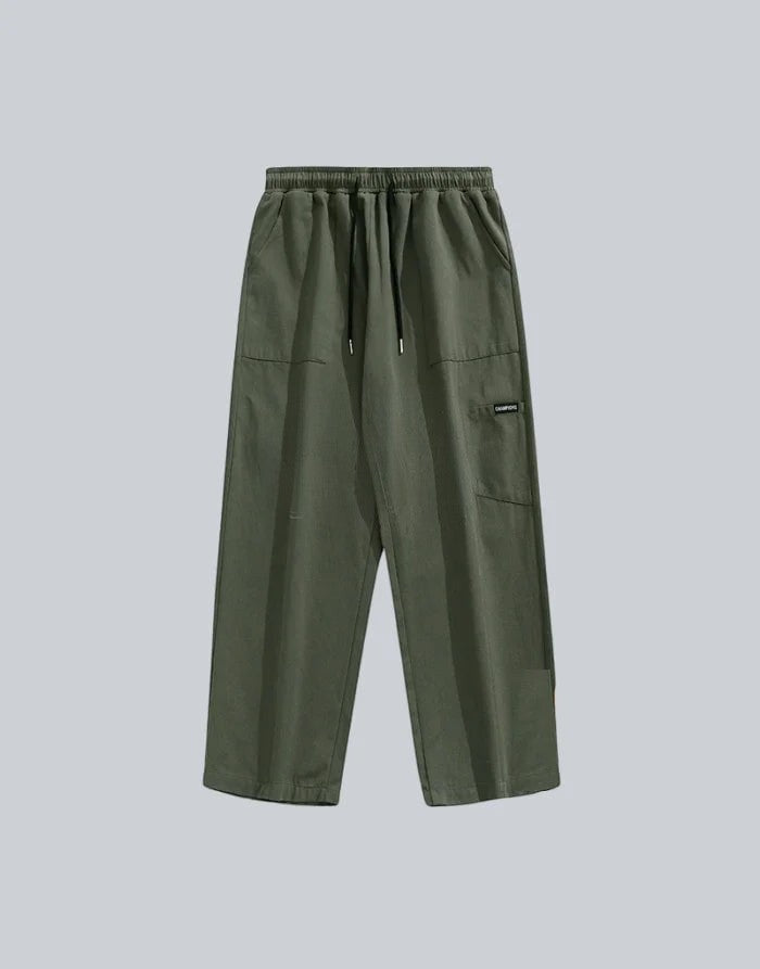 Clotechnow olive green wide-leg hakama pants with an elastic drawstring waist and side pockets.
