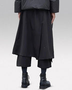 Clotechnow Tattsuke Profile Hakama pants in black with a wide-leg layered silhouette worn with black boots