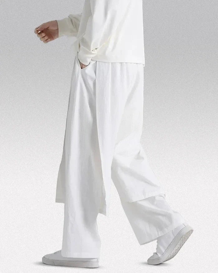 Clotechnow white lightweight drape hakama pants with a wide-leg silhouette worn by a model with white sneakers