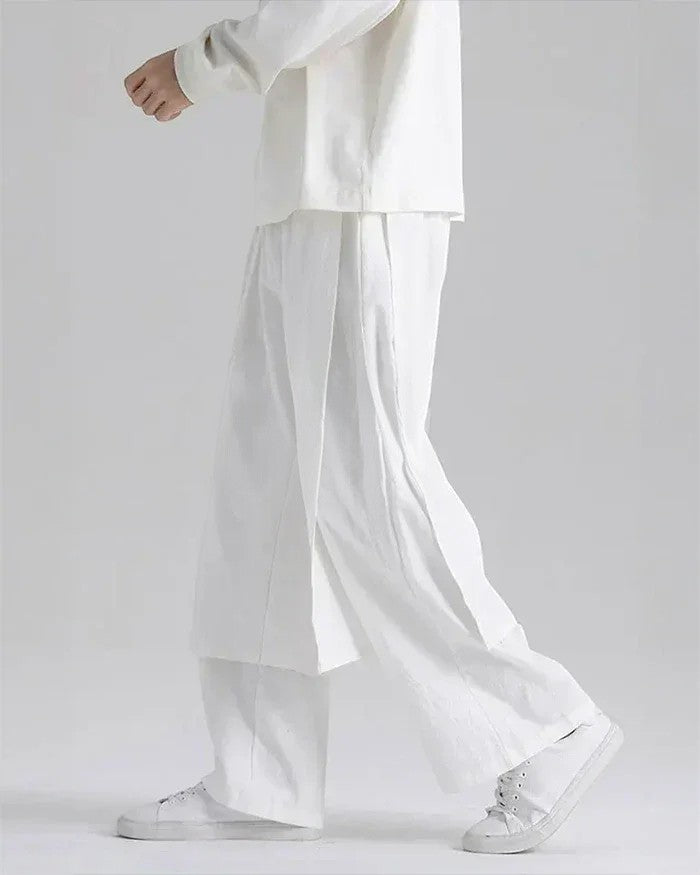 Clotechnow white lightweight drape hakama pants with a wide-leg silhouette worn by a model in a studio setting
