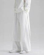 Clotechnow white lightweight drape hakama pants with a wide-leg silhouette and layered fabric detail on a model