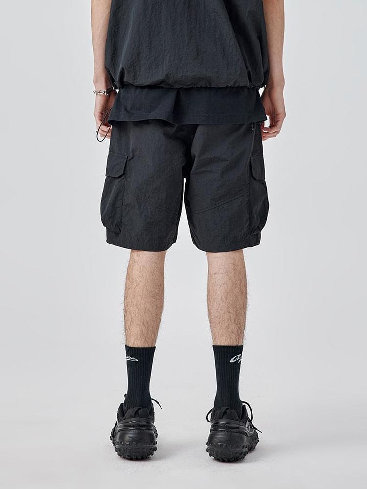 Trendy cargo shorts with a youthful pop aesthetic, ideal for teen guys. Featuring a loose fit, mid-rise waist, and multiple pockets for a stylish and functional look.