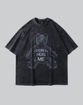 Oversized distressed graphic techwear tee with bold typographic statement and worn aesthetic for alternative urban styling — view 1