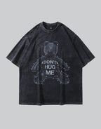 Oversized distressed graphic techwear tee with bold typographic statement and worn aesthetic for alternative urban styling — view 1