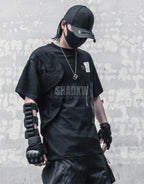 Minimal utility techwear t-shirt in dark tone with clean lines, extended hem, and understated futuristic street style — view 3