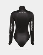 Black long-sleeve fitted bodysuit with multiple gothic-style graphic accents across the torso and sleeves for layered outfits — view 2