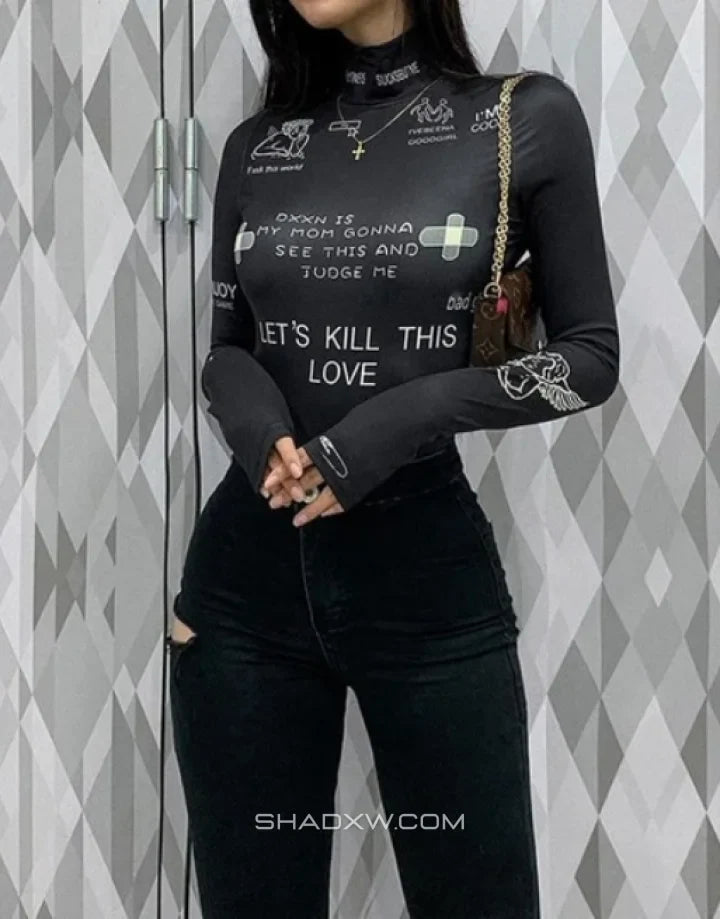 Black long-sleeve fitted bodysuit with multiple gothic-style graphic accents across the torso and sleeves for layered outfits — view 3