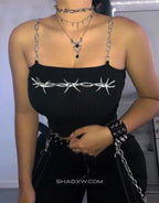 Short goth crop top with white barbed wire graphic across the chest and metal-style chain shoulder straps for a street goth look — view 2
