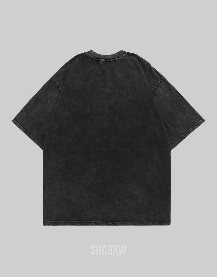 Muted grey oversized techwear t-shirt with a polished metallic heart emblem graphic and structured urban styling visible — view 3