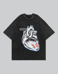 Muted grey oversized techwear t-shirt with a polished metallic heart emblem graphic and structured urban styling visible — view 1