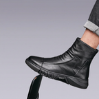 Black Clotechnow leather ankle boot worn with cuffed jeans