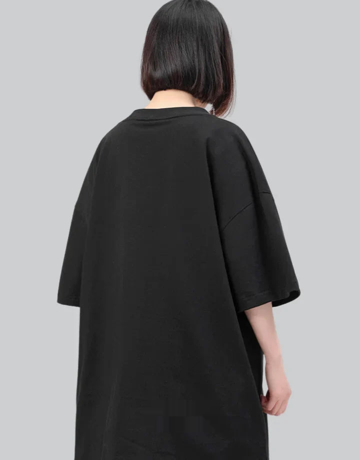 Monochrome oversized techwear shirt with minimalist paneling and extended hem in black and white options for contemporary streetwear looks — view 5