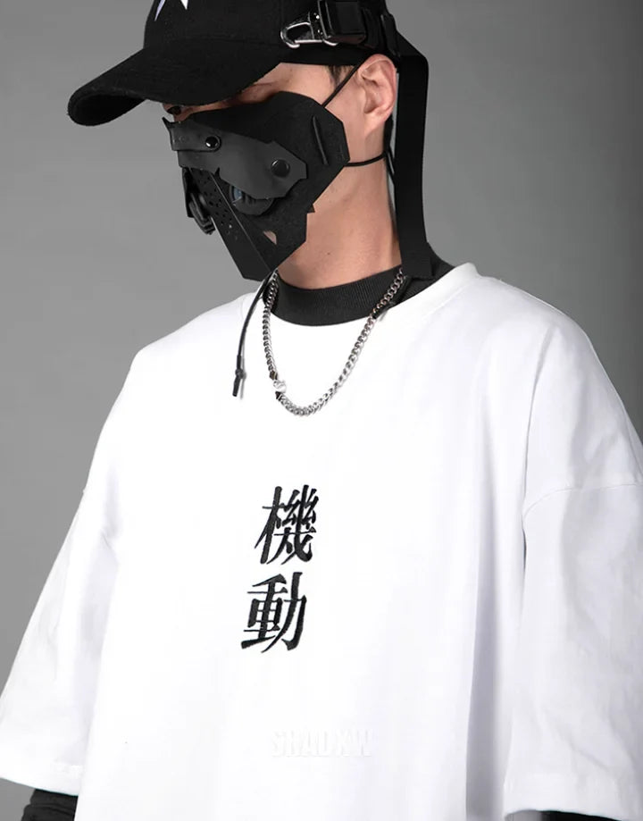 Monochrome oversized techwear shirt with minimalist paneling and extended hem in black and white options for contemporary streetwear looks — view 12