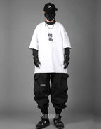 Monochrome oversized techwear shirt with minimalist paneling and extended hem in black and white options for contemporary streetwear looks — view 13
