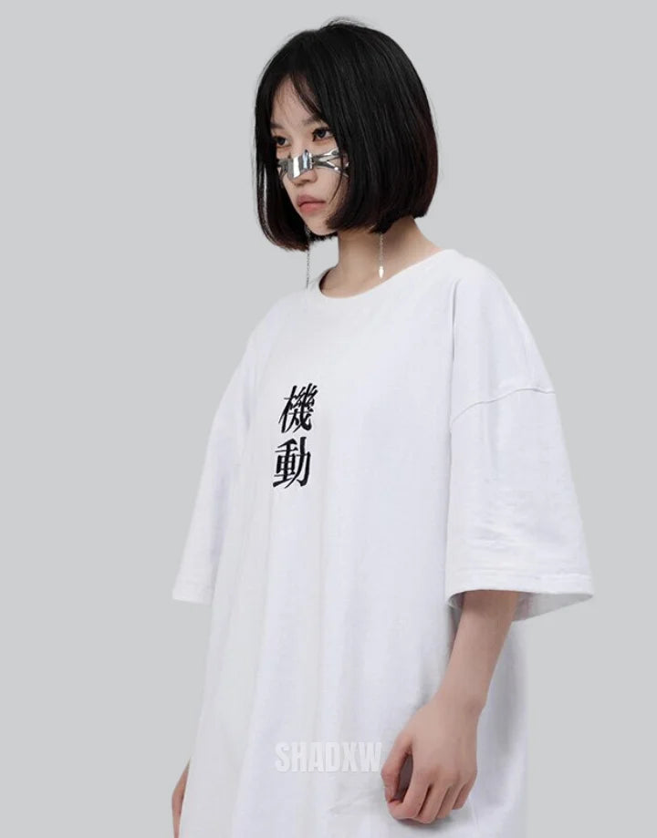 Monochrome oversized techwear shirt with minimalist paneling and extended hem in black and white options for contemporary streetwear looks — view 10