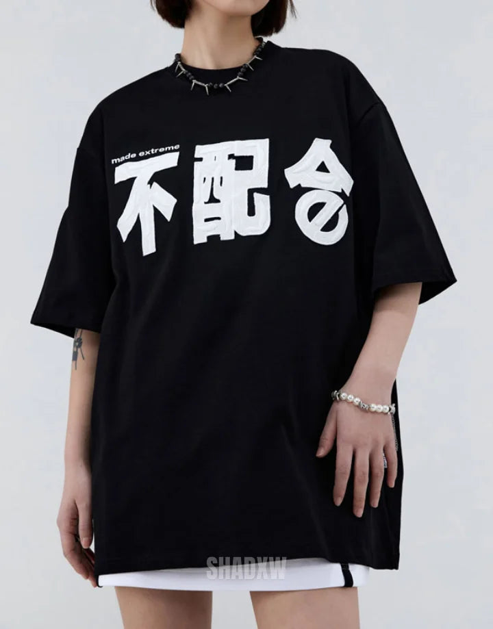 Oversized street techwear tee with exaggerated shoulders and long hem in a muted palette for futuristic urban styling — view 2
