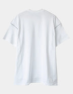 Black and white techwear t-shirt featuring a patterned light-responsive surface that brightens under illumination in urban styling — view 5
