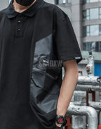 Black short-sleeve multi-pocket tech shirt with modular front panels and adjustable back drawcords in urban minimalist style — view 6