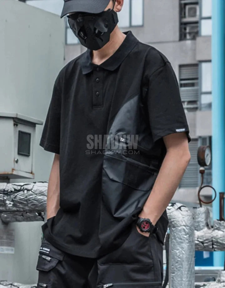 Black short-sleeve multi-pocket tech shirt with modular front panels and adjustable back drawcords in urban minimalist style — view 4