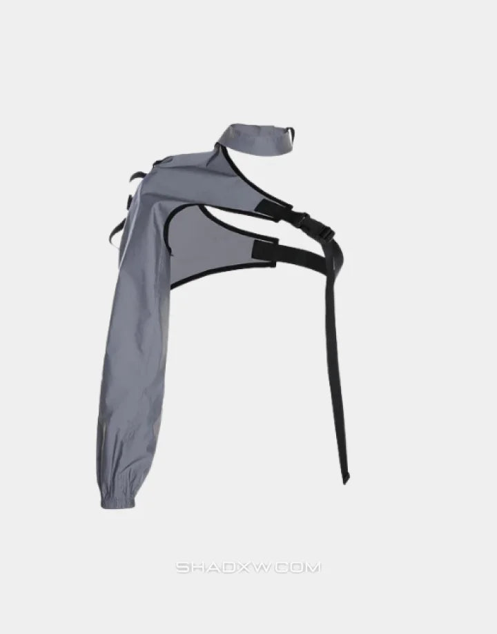 Asymmetric one-shoulder techwear top shown in black and reflective finish options with a sculptural shoulder line and modern urban styling — view 4