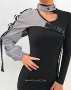 Asymmetric one-shoulder techwear top shown in black and reflective finish options with a sculptural shoulder line and modern urban styling — view 5