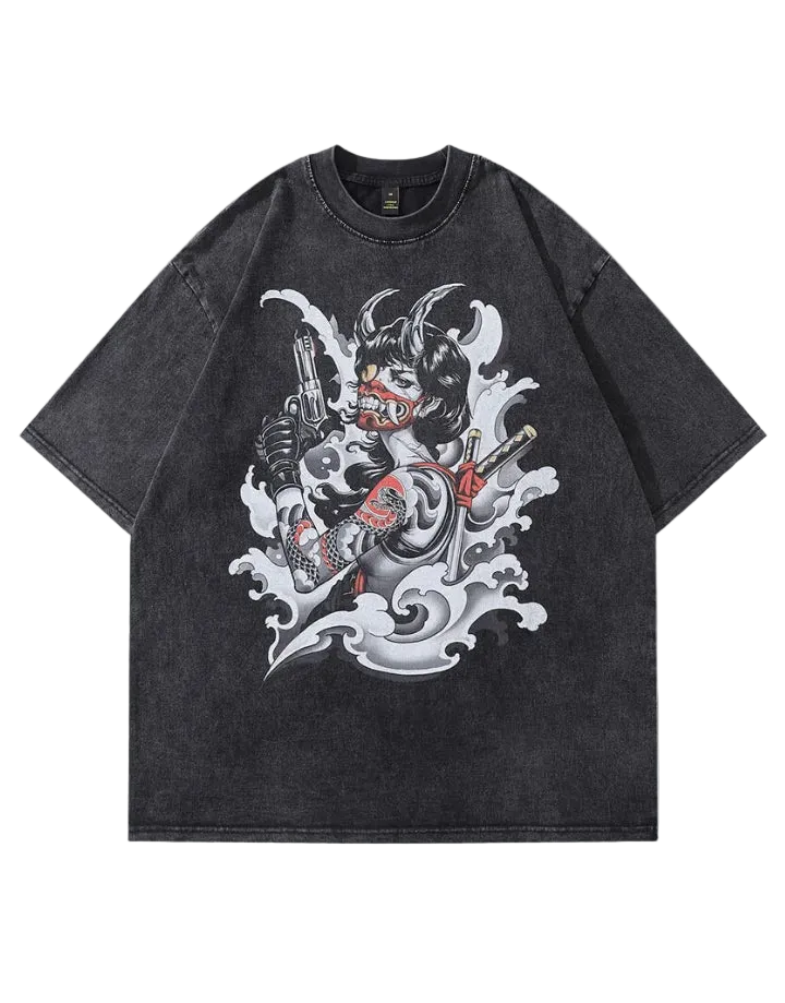 A dark gray mineral-wash short-sleeve t-shirt featuring a large graphic print of a horned devil character with a guitar and pistols amidst white waves, shown against a solid gray background.