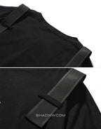 Black techwear short-sleeve shirt with twin front pockets and decorative shoulder-to-chest straps in urban tactical style — view 5