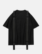 Black techwear short-sleeve shirt with twin front pockets and decorative shoulder-to-chest straps in urban tactical style — view 2