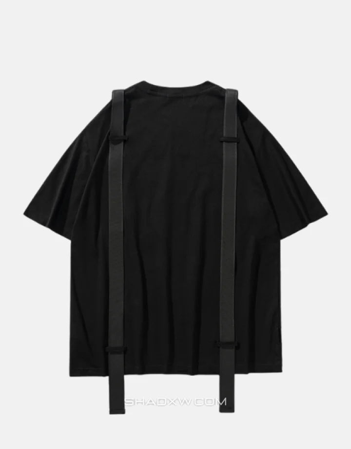 Black techwear short-sleeve shirt with twin front pockets and decorative shoulder-to-chest straps in urban tactical style — view 2