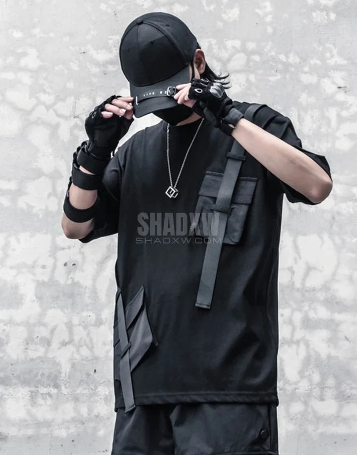 Tactical-style short-sleeve techwear shirt with pronounced front pockets and panel detailing for an urban utility aesthetic — view 5