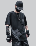 Tactical-style short-sleeve techwear shirt with pronounced front pockets and panel detailing for an urban utility aesthetic — view 1