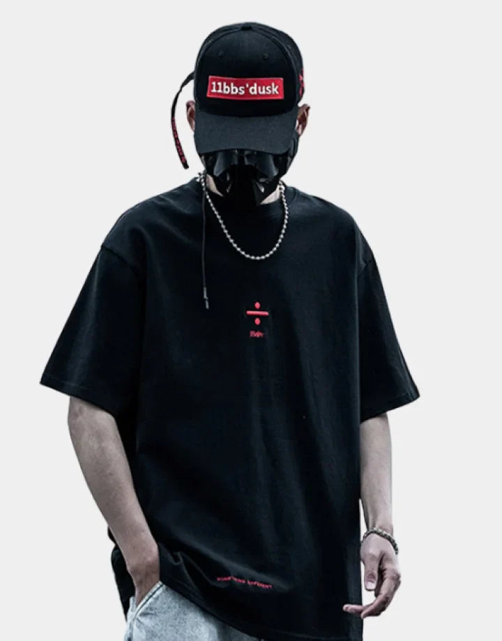 Shooting-style techwear shirt with subtle embroidered emblem, clean shoulder line and minimalist aesthetic available in multiple colorways — view 1