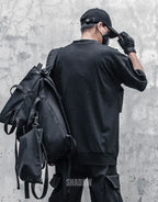 Crew-neck techwear shirt with chest panel accents and layered seam details in a modern urban aesthetic suitable for layering — view 4
