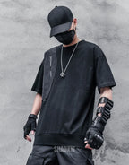 Crew-neck techwear shirt with chest panel accents and layered seam details in a modern urban aesthetic suitable for layering — view 3