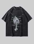 Longline oversized tee with large retro skeleton linework graphic, presenting vintage anatomical motifs on a techwear silhouette — view 1