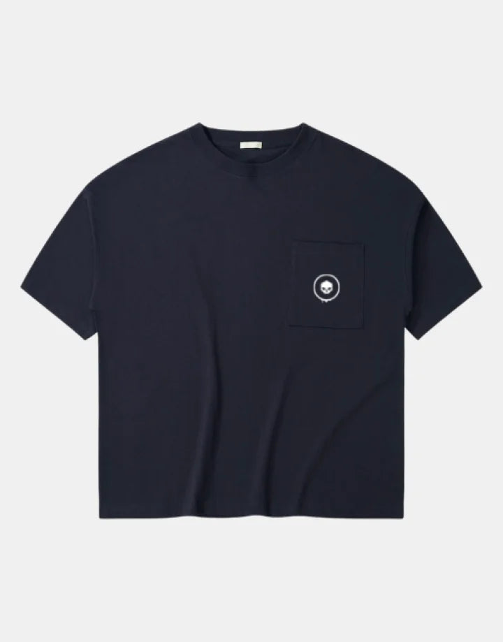 Women's short-sleeve techwear tee shown in black and white with a large center pocket and two smaller utility pockets on the front — view 1