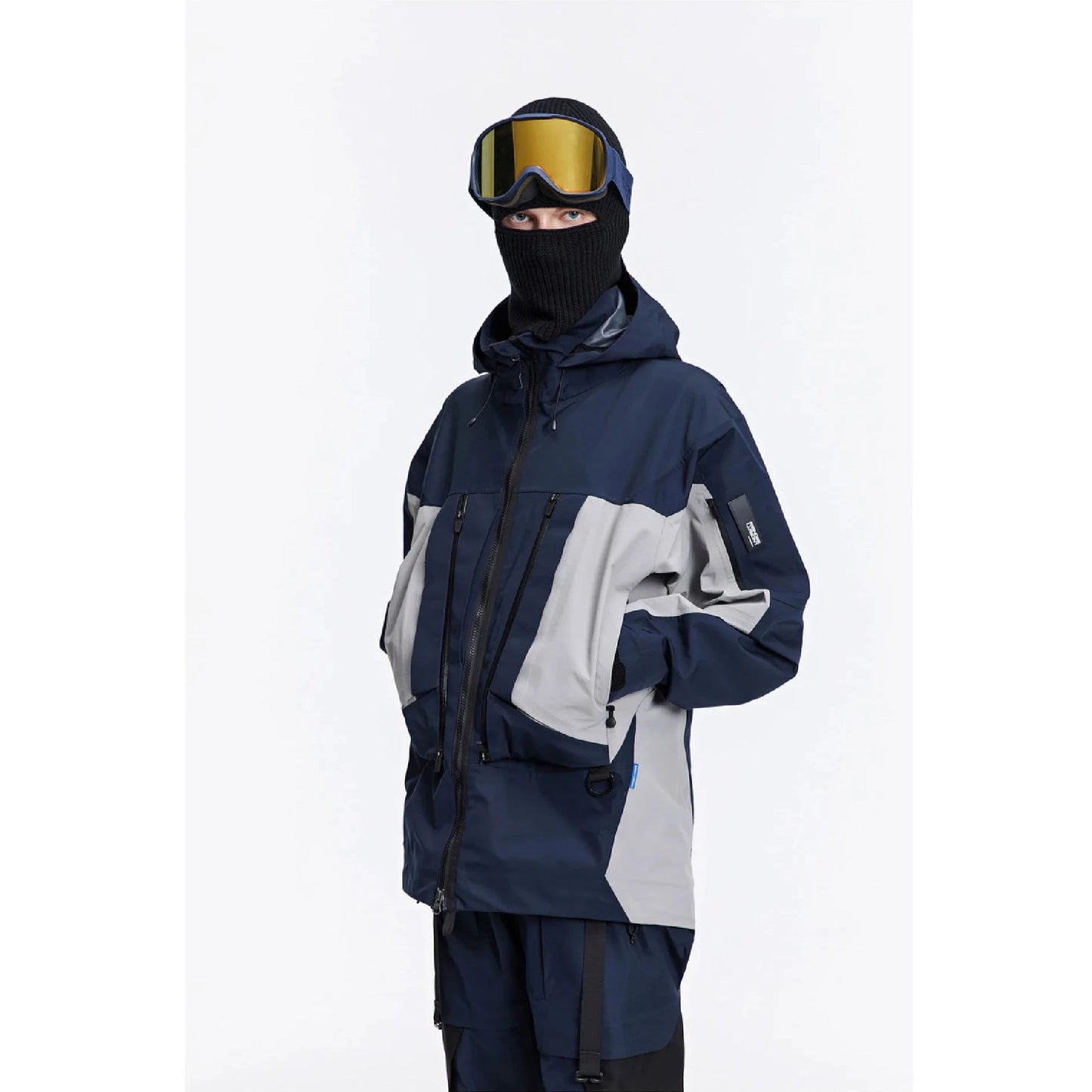 A man wearing The 0107 Ski Down Techwear Jacket in blue Color